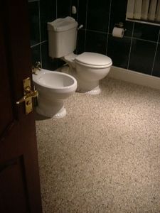 The Contemporary Flooring - white multi pebble in bathroom - Floor Tile